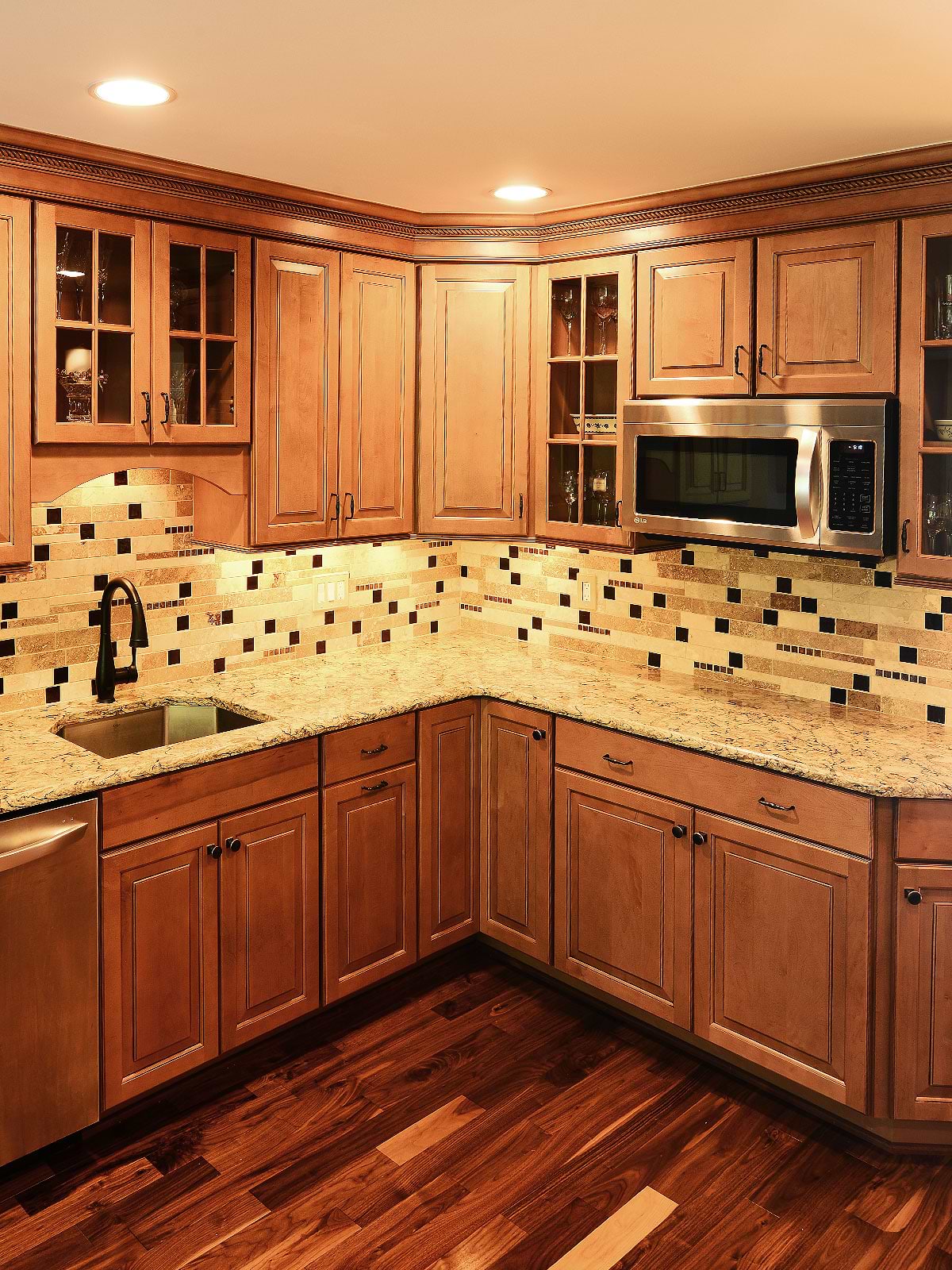 Brown cabinets quartz countertop travertine backsplash tile 3 BA1025