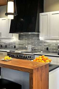 white cabinets black countertop with slate subway backsplash tile BA1045