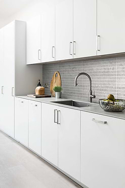 Contemporary Kitchen White Cabinets Gray Backsplash Tile