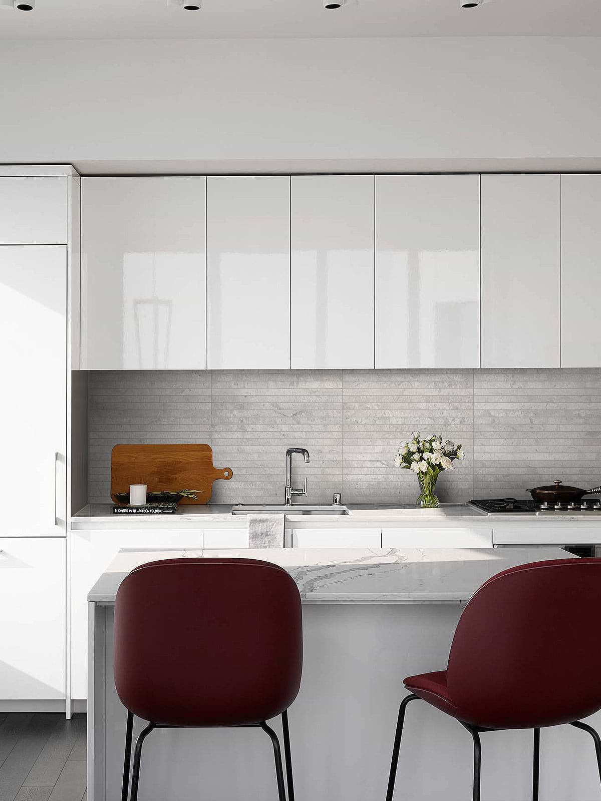 Modern white kitchen with gray backsplash tile