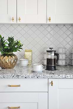 White polish glazed porcelain arabesque 11 in x 9.7 in wall Tile. Mesh-Mounted makes installation a much easier process. This glossy porcalein created antique pattern for install project for bathrooms and kitchens.