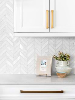 white marble countertop kitchen cabinets with white chevron marble tile BA631613