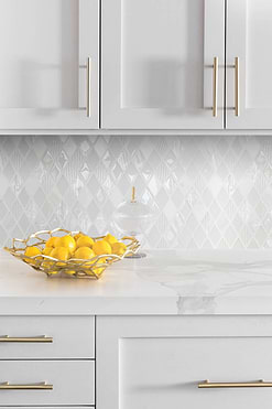 Calacatta Gold Countertop White Backsplash Tile