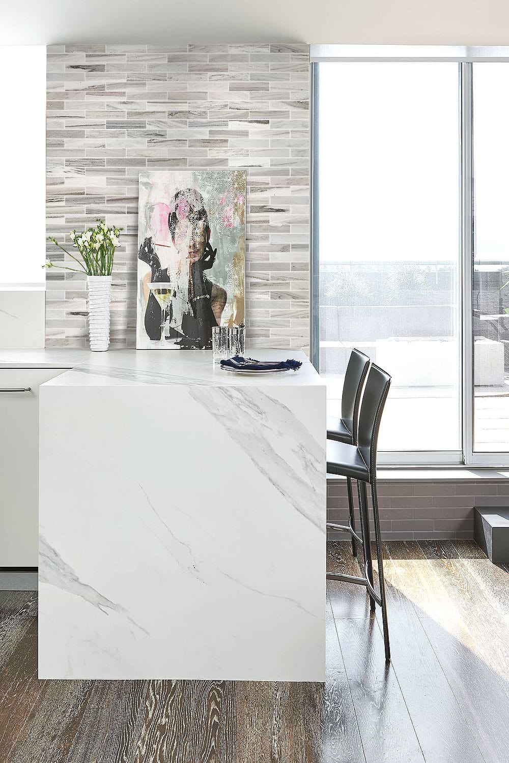white countertop island full wall backsplash tile