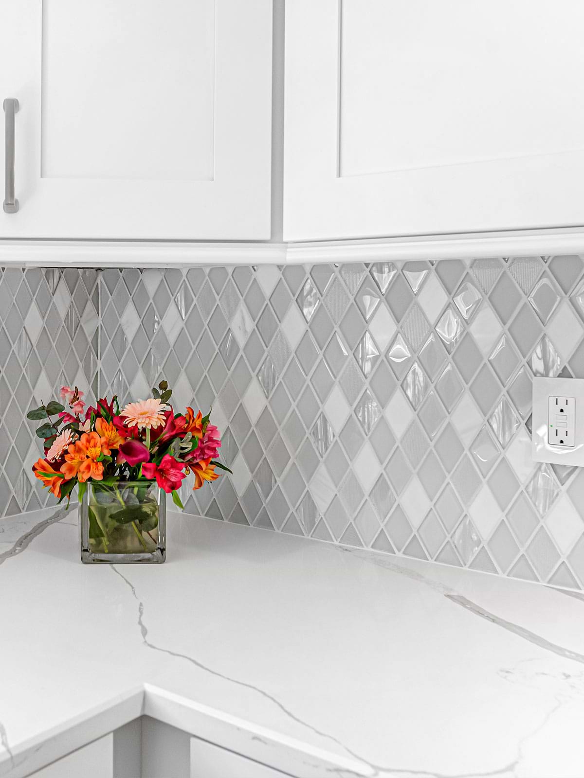 Quartz Countertop With Gray Veins Glass And Marble Backsplash Tile White Cabinet BA62046
