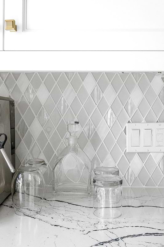 White Countertop With Dark Veins Glass And Marble Backsplash Tile BA62046