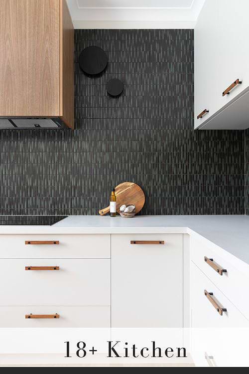 Black Backsplash with White Countertops