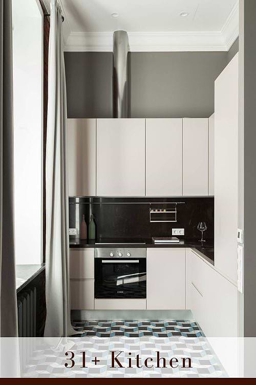 White Kitchen with Stainless Steel Appliance