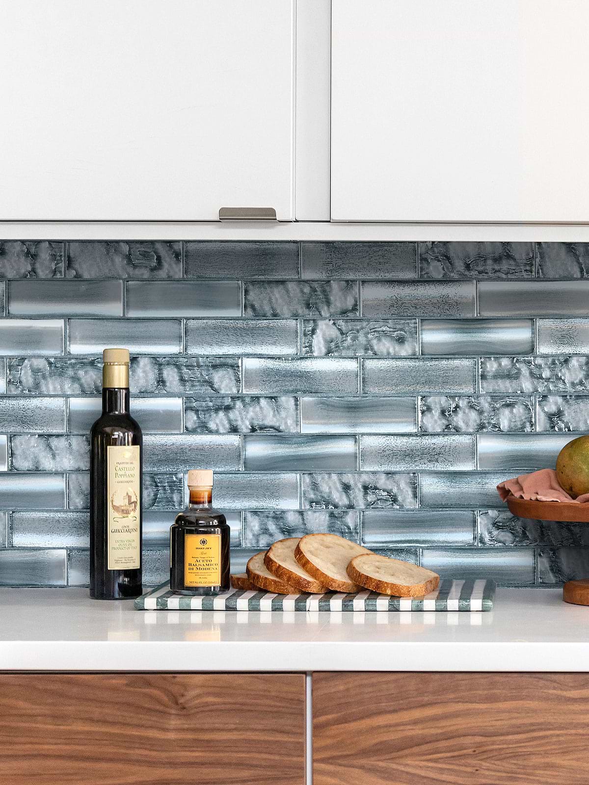 Brown Cabinets With Space Blue Subway Glass Backsplash Tile