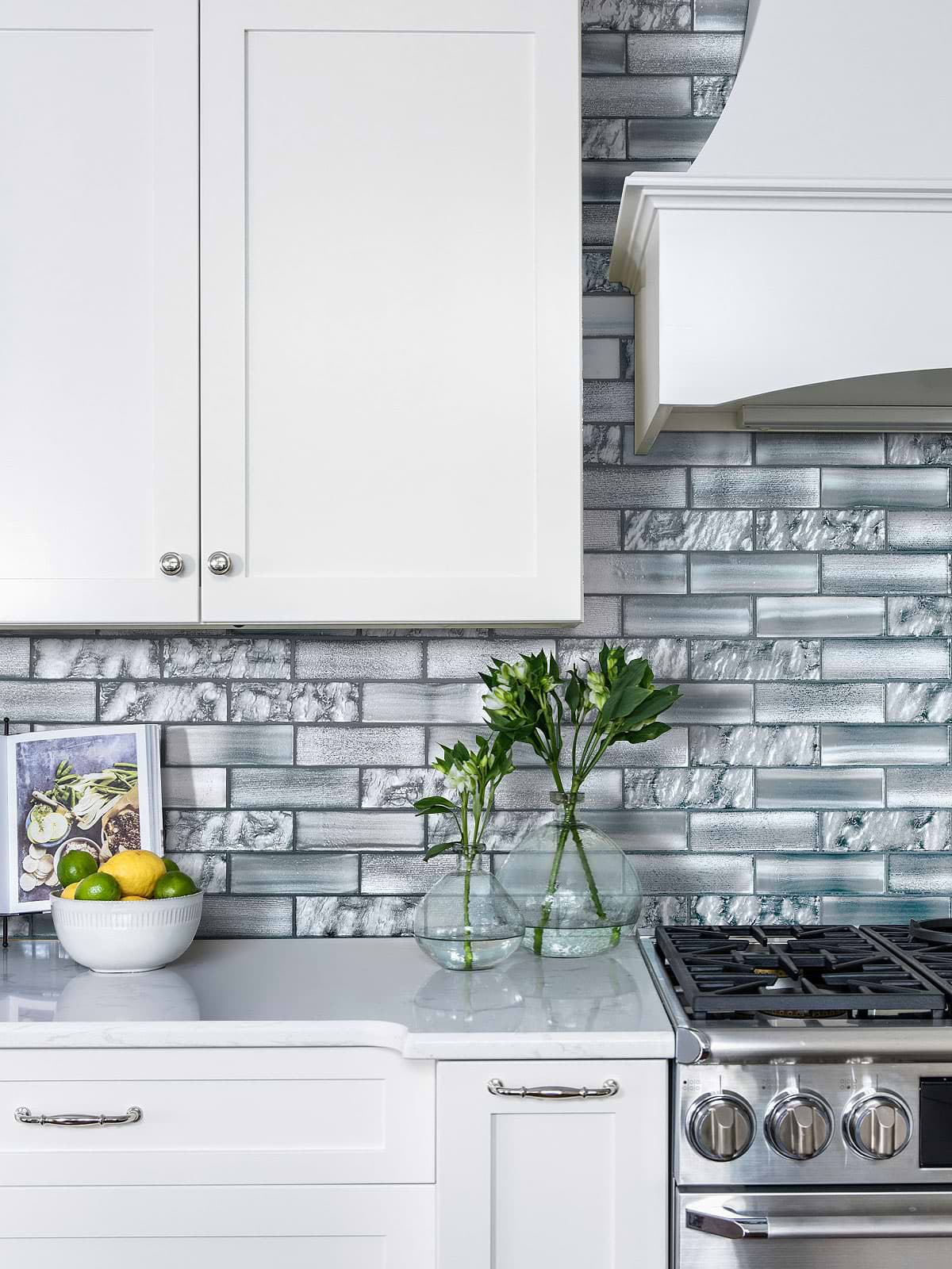 White Cabinet with Space Blue Subway Glass Backsplash Tile