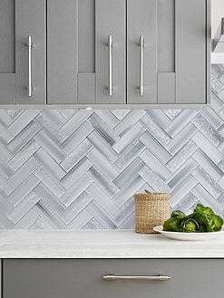 Gray Kitchen Cabinets with Blue Gray Herringbone Glass Tile BA5507