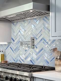 Light Blue Cabinet with Ocean Blue Glass Herringbone Tile BA5507