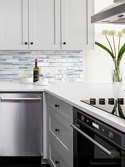 Light Gray Cabinets with Blue Gray Subway Glass Tile BA5507