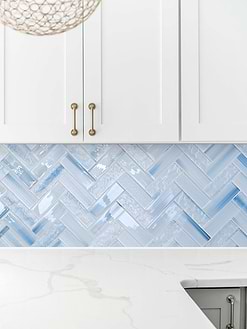 White Quartz Countertop with Ocean Blue Glass Herringbone Tile BA5507