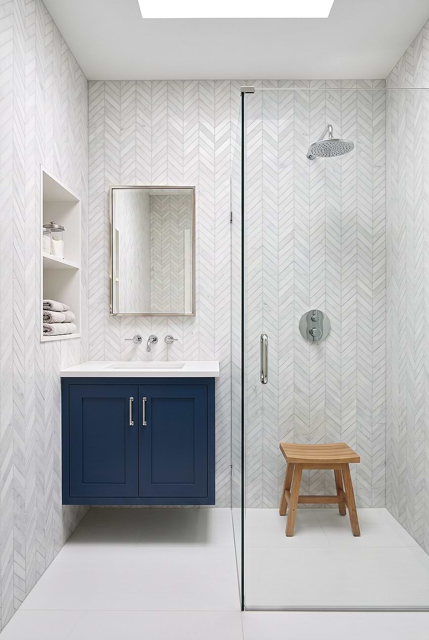 White Textured Marble Chevron Mosaic Wall with Navy Cabinetry BA631613