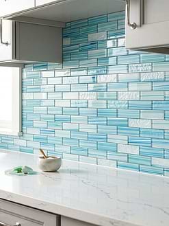 Light Gray Cabinets White Quartz Countertops with Ocean Wave Blue Glass Subway Tile BA5563
