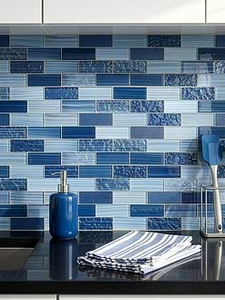White Flat Panel Cabinets Dark Gray Polished Countertops with Blue Glass Subway Tile BA5530