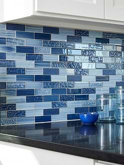 White Shaker Cabinets Polished Black Stone Countertops with Blue Glass Subway Tile BA5530