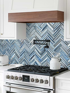 White Shaker Cabinets White Solid Surface Countertops with Blue Herringbone Tile BA5525