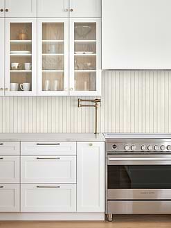 Modern Beige Backsplash Tile with White Kitchen Cabinets