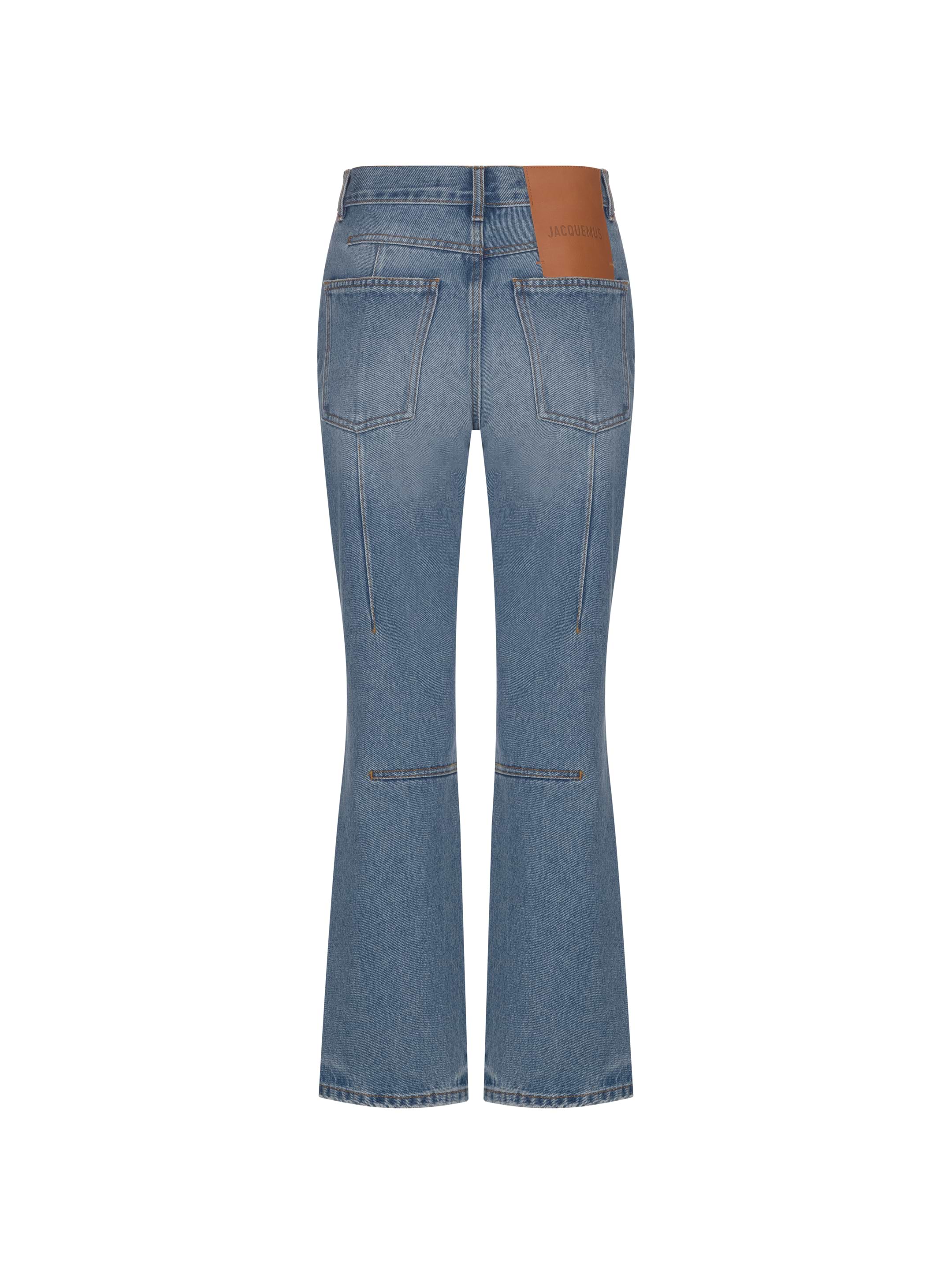 【送料&関税込】Jacquemus Distressed-effect Flared Jeans Le de Nîmes flared jeans in beige - Jacquemus | Mytheresa