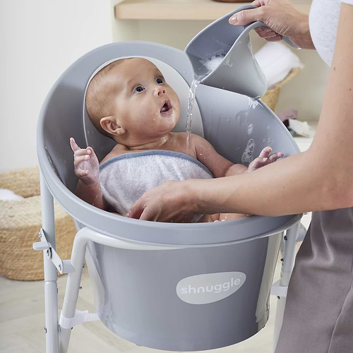 משפך עדין לאמבטיה בצבע פרחים מבית Shnuggle 