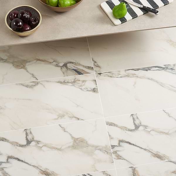 Lithe Calacatta Rustico 12x24 Matte; in Cream with Black and Gold Veining Porcelain; for Backsplash, Bathroom Floor, Bathroom Wall, Commercial Floor, Floor Tile, Kitchen Floor, Kitchen Wall, Outdoor Floor, Outdoor Wall, Shower Wall, Wall Tile; in Style Ideas Art Deco, Beach, Classic, Contemporary, Craftsman, Modern, Traditional, Transitional