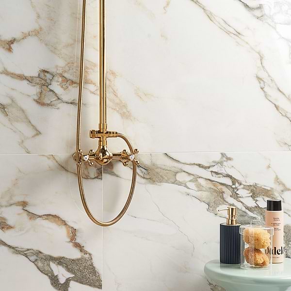 Lithe Calacatta Rustico 24x48 Polished; in Cream with Black and Gold Veining Porcelain; for Backsplash, Bathroom Floor, Bathroom Wall, Commercial Floor, Floor Tile, Kitchen Floor, Kitchen Wall, Outdoor Floor, Outdoor Wall, Shower Wall, Wall Tile; in Style Ideas Art Deco, Beach, Classic, Contemporary, Craftsman, Modern, Traditional, Transitional