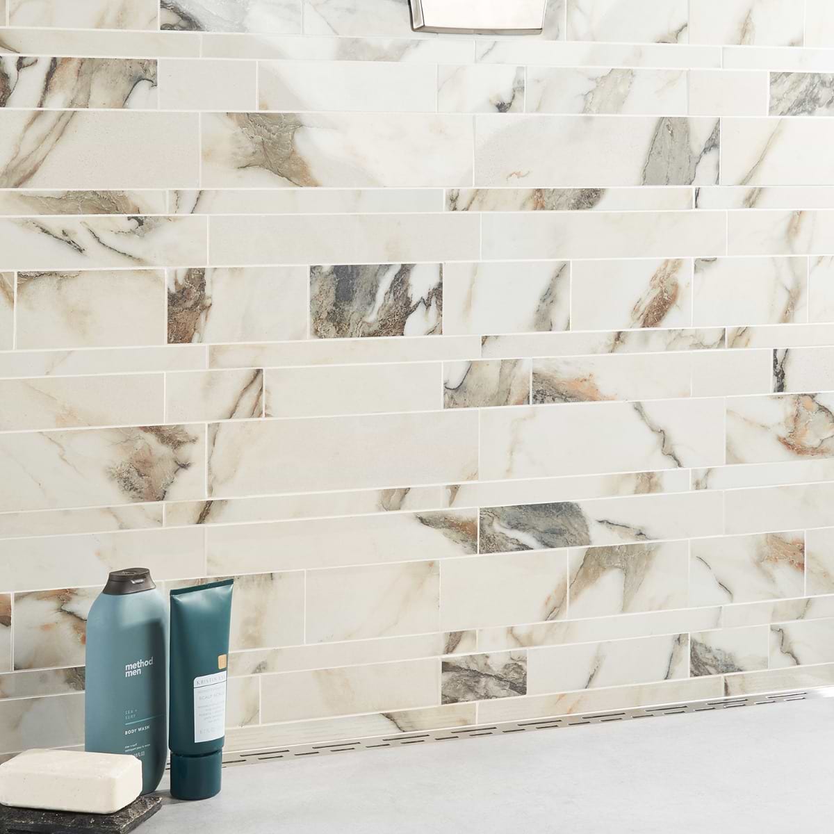 Lithe Calacatta Rustico Railroad Polished; in Cream with Black and Gold Veining Porcelain; for Backsplash, Bathroom Floor, Bathroom Wall, Commercial Floor, Floor Tile, Kitchen Floor, Kitchen Wall, Outdoor Floor, Outdoor Wall, Pool Tile, Shower Floor, Shower Wall, Wall Tile; in Style Ideas Art Deco, Beach, Classic, Contemporary, Craftsman, Modern, Traditional, Transitional