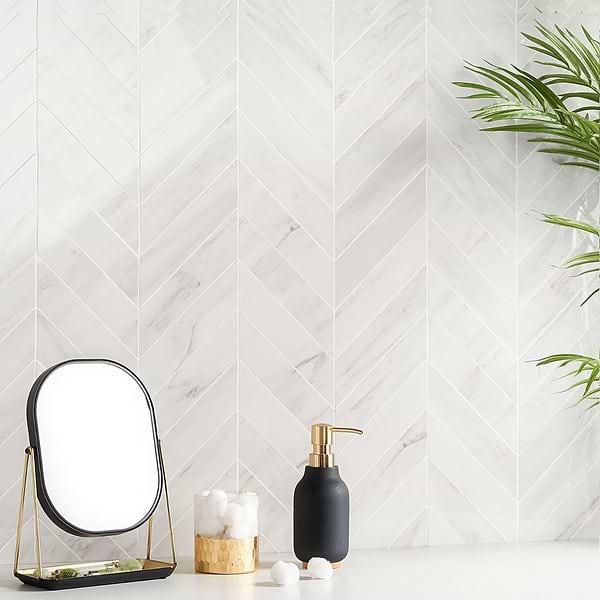 Lithe Dolomite Snow 2x8 Chevron Polished; in White with Grey Veining Porcelain; for Backsplash, Bathroom Floor, Bathroom Wall, Commercial Floor, Floor Tile, Kitchen Floor, Kitchen Wall, Outdoor Floor, Outdoor Wall, Pool Tile, Shower Floor, Shower Wall, Wall Tile; in Style Ideas Art Deco, Beach, Classic, Contemporary, Craftsman, Modern, Traditional, Transitional