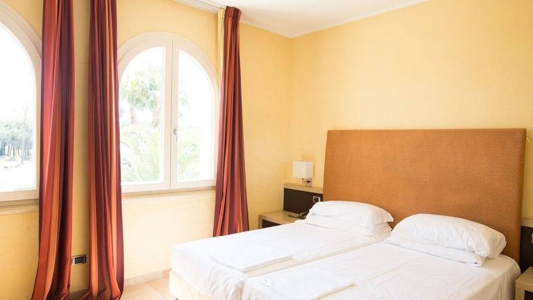 hotel club twin bedroom