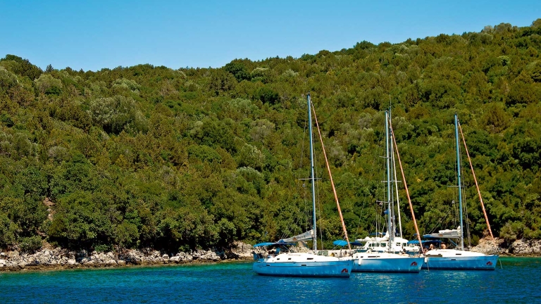 Yachts moored up in a bay