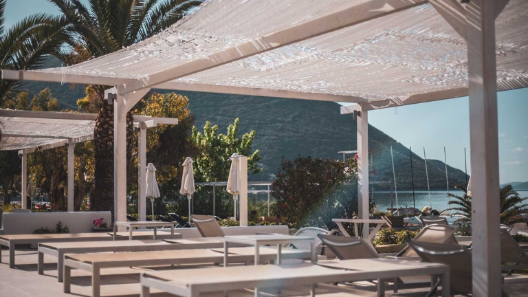 Beachfront terrace at Cosmos Beach Club