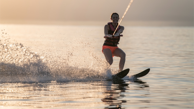 Water skiing at Buca Beach Club