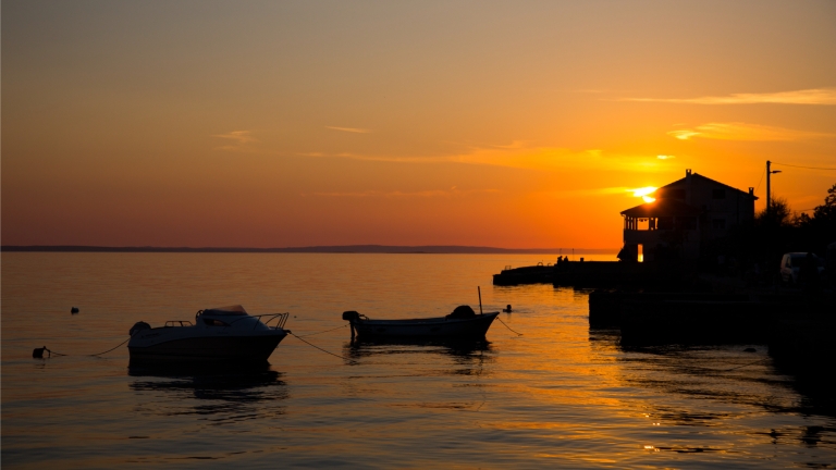 Local village at sunset near Alana Beach Club 