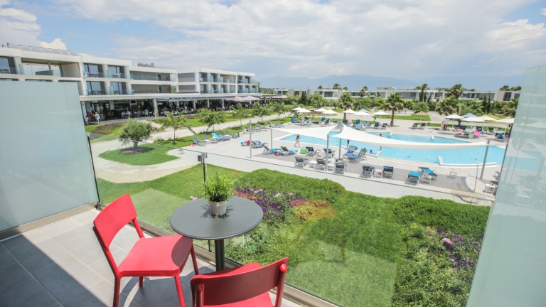 Balcony view of pool at Messini Beach Club