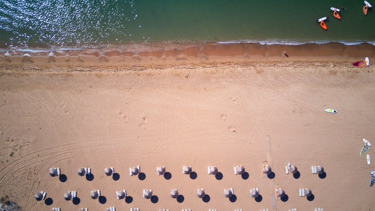 Aerial view of Analipsi beach at Buca Beach Club