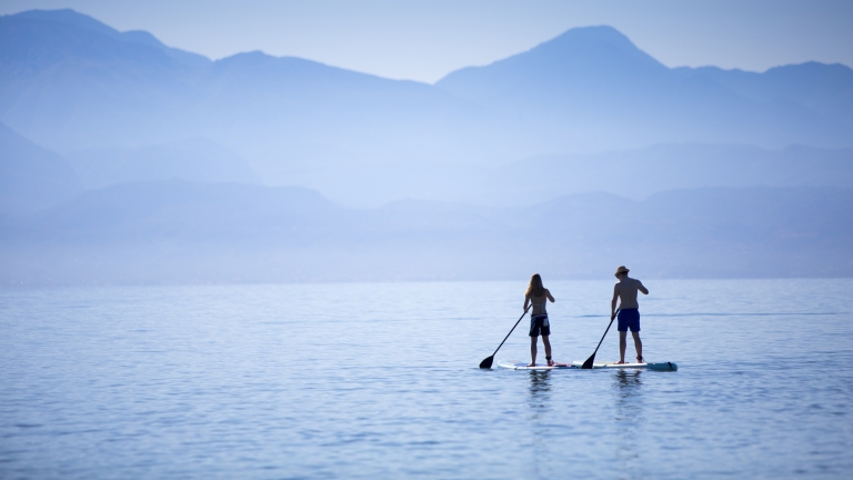 Paddle boarding at Buca Beach Club