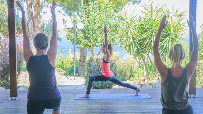 Early morning yoga at Vounaki Beach Club