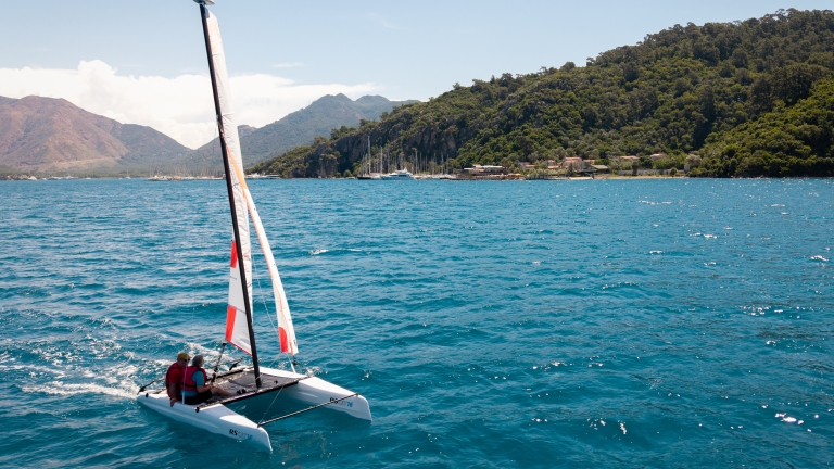 Sailing the catamarans at Neilson | Cook's Club Adakoy