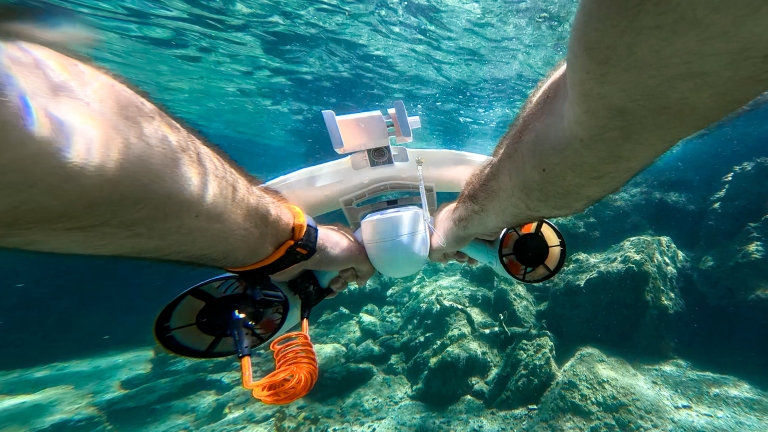 Underwater adventures with sea scooters at Neilson | Cook's Club Adakoy