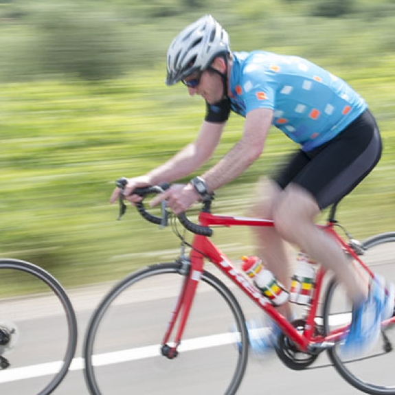 Group of people road cycling in Greece