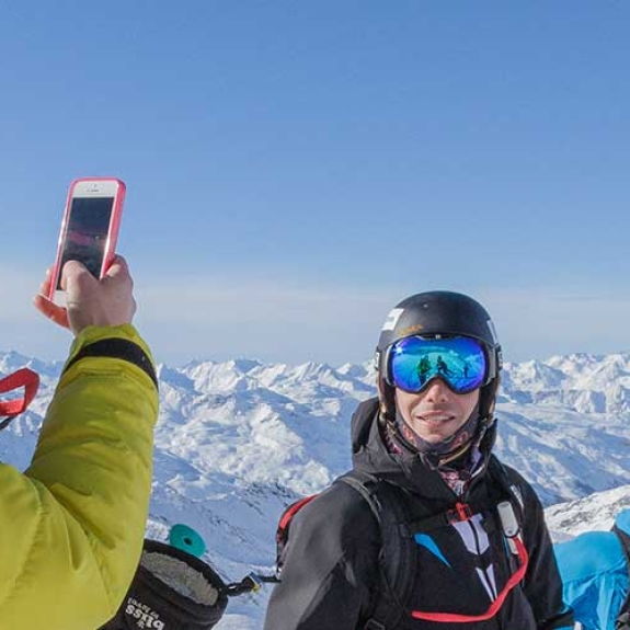 People posing for photo on a mountain in Val Thorens