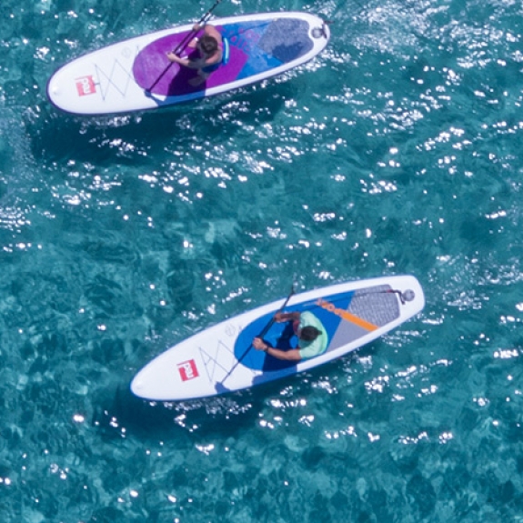 aerial view of group stand up paddle boarding