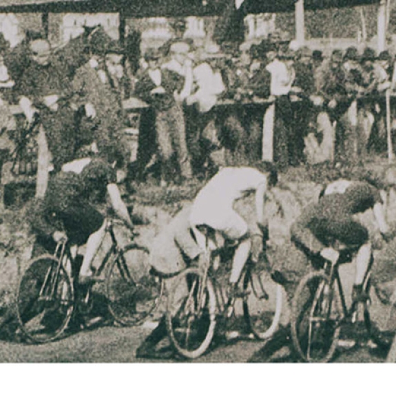 old black and white photograph of cyclists