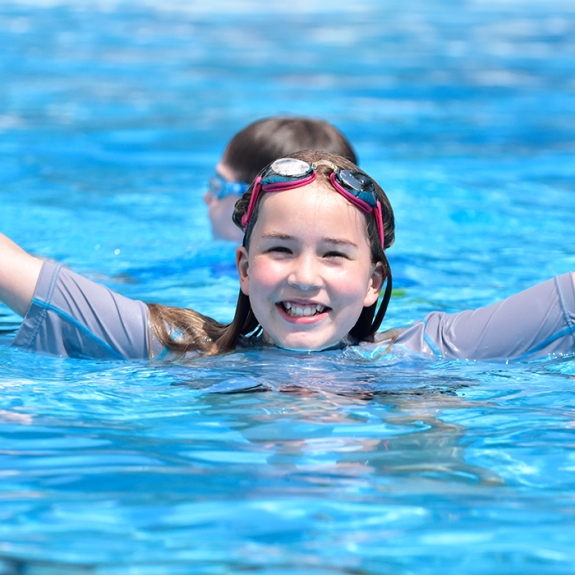 young girl in swimming pool