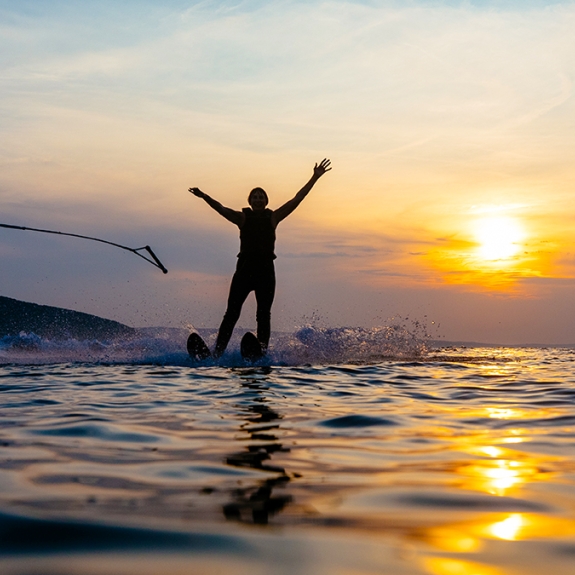 lady waterskiing at sunset in Croatia