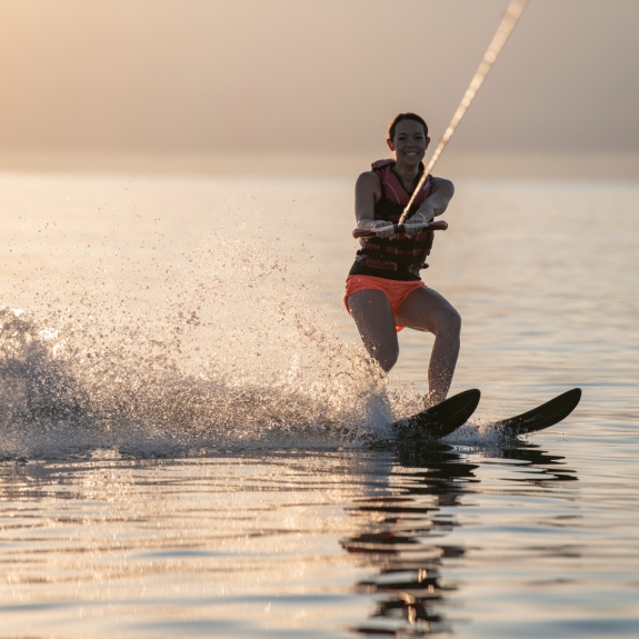 Water skiing at Buca Beach Club