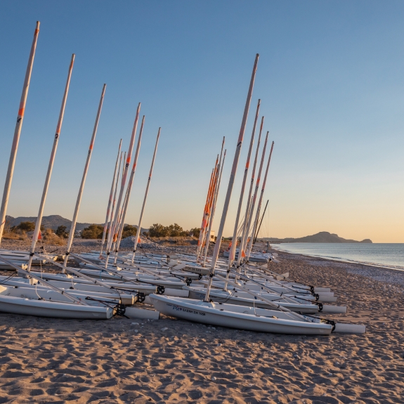 Dinghies on the beach at Levante Beach Club