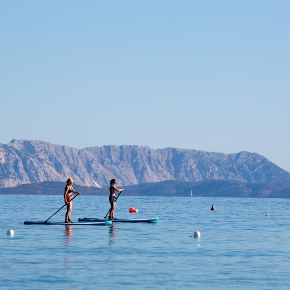 Paddle boarding at Baia dei Mori Beach Club